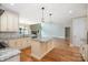Open kitchen and living space with hard wood flooring and stainless steel appliances at 101 Mcalway Rd, Charlotte, NC 28211