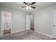 Neutral bedroom with carpeted floors, access to the bathroom, and another door to another room at 108 Graham St, Stanley, NC 28164