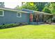 Charming single-story home with a well-maintained lawn, inviting walkway, and quaint front porch at 108 Graham St, Stanley, NC 28164