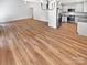 Open concept living room flows into the kitchen and features wood floors throughout at 10934 Coachman Cir, Charlotte, NC 28277