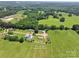 Expansive aerial view of a charming single-Gathering home on a sprawling, verdant lot, offering privacy and space at 1133 Lynn Ln, Catawba, NC 28609