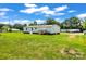 Exterior of home with large backyard and propane tank on a sunny day at 1133 Lynn Ln, Catawba, NC 28609