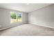 Comfortable bedroom features new carpeting and a large window for natural light at 1133 Lynn Ln, Catawba, NC 28609