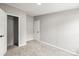 A bedroom with neutral walls, carpet, closet, and door provide ample space at 1133 Lynn Ln, Catawba, NC 28609