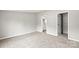 View of a bedroom with neutral decor and a doorway leading to an adjacent bathroom at 1133 Lynn Ln, Catawba, NC 28609