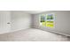 Bright bedroom with a neutral color scheme and a large window offering plenty of natural light at 1133 Lynn Ln, Catawba, NC 28609
