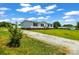 Lovely single-Gathering home featuring a charming exterior, well-kept lawn and gravel driveway at 1133 Lynn Ln, Catawba, NC 28609