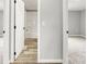 View of hallway showcasing bathroom and bedrooms with neutral walls and carpet at 1133 Lynn Ln, Catawba, NC 28609