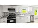 Well-equipped kitchen boasts stainless steel appliances and granite countertops at 1133 Lynn Ln, Catawba, NC 28609