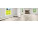 Open-concept living room with neutral walls, a stone fireplace, and modern flooring at 1133 Lynn Ln, Catawba, NC 28609