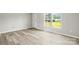 Living room featuring neutral paint, modern flooring and a bright window at 1133 Lynn Ln, Catawba, NC 28609