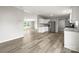 Open-concept living area flows seamlessly into the kitchen, featuring hardwood floors and natural light at 1133 Lynn Ln, Catawba, NC 28609