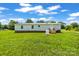 View of the back of the home with a propane tank at 1133 Lynn Ln, Catawba, NC 28609