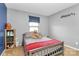 Playful bedroom with a stuffed sloth on the bed and whimsical decor for a cozy space at 1288 Century Dr, Clover, SC 29710