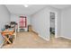 Neutral bedroom featuring a desk, red blinds, and gray walls creating a calming space at 1288 Century Dr, Clover, SC 29710