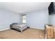 Minimalist bedroom with a twin bed, sleek dresser, and a large window, for a restful atmosphere at 1288 Century Dr, Clover, SC 29710