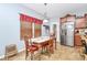 Dining area features a wooden table set near the kitchen with stainless steel refrigerator at 1288 Century Dr, Clover, SC 29710