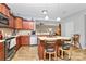 Spacious eat-in kitchen featuring a center island with barstool seating and tile floors at 1288 Century Dr, Clover, SC 29710