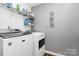 Functional laundry room equipped with a washer and dryer for effortless chores at 1288 Century Dr, Clover, SC 29710