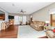 Comfortable living room featuring hardwood floors, ceiling fan, and ample seating at 1288 Century Dr, Clover, SC 29710