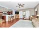 Spacious living area with hardwood floors, natural light, and a view into the kitchen at 1288 Century Dr, Clover, SC 29710