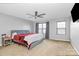 Spacious main bedroom features a ceiling fan, carpet flooring, and natural light at 1288 Century Dr, Clover, SC 29710