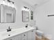 Bright bathroom features a double sink vanity and modern fixtures at 12914 Sickles Dr, Charlotte, NC 28273