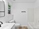 This bathroom features a white vanity and shower/tub combo at 12914 Sickles Dr, Charlotte, NC 28273