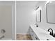 Bright bathroom with double vanity and shower-tub combo at 12914 Sickles Dr, Charlotte, NC 28273