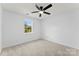 Well-lit bedroom features a window bringing in natural light at 12914 Sickles Dr, Charlotte, NC 28273