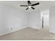 Bedroom features a ceiling fan and carpet floors at 12914 Sickles Dr, Charlotte, NC 28273