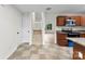 Open floor plan view with stairway and stainless steel appliances at 12914 Sickles Dr, Charlotte, NC 28273