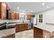 Updated kitchen features stainless steel appliances, granite countertops, and a convenient kitchen island at 12914 Sickles Dr, Charlotte, NC 28273