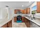 The updated kitchen showcases granite countertops and stainless steel appliances at 12914 Sickles Dr, Charlotte, NC 28273