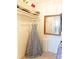 Walk in closet with organizers, shelving and a floor length mirror at 1323 Queens Rd # 327, Charlotte, NC 28207