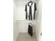 This simple closet features a rod for hanging clothes, along with a shelf for storage at 1323 Queens Rd # 327, Charlotte, NC 28207