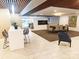 Spacious clubhouse with modern decor, dining area, and comfortable seating at 1323 Queens Rd # 327, Charlotte, NC 28207