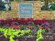 Elegant community sign with colorful flowers and landscaped beds at Charlotte House, 1323 Queens Road at 1323 Queens Rd # 327, Charlotte, NC 28207