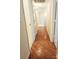 Hallway features wood floors, leading to the various rooms, enhancing the home's warm and inviting appeal at 1323 Queens Rd # 327, Charlotte, NC 28207
