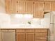 Bright kitchen featuring white cabinets, countertops, and appliances, offering a clean and functional cooking space at 1323 Queens Rd # 327, Charlotte, NC 28207