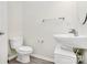 Powder room features a sleek vessel sink, modern fixtures, and minimalist design at 1427 Rosemont Dr, Indian Land, SC 29707
