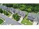 Aerial view of the home with a well manicured front lawn and driveway at 1427 Rosemont Dr, Indian Land, SC 29707