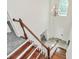 Grand foyer features a hardwood staircase, elegant chandelier, and arched window at 1427 Rosemont Dr, Indian Land, SC 29707