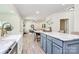 Spacious kitchen with an island, seamlessly connecting to the living room for a cohesive living space at 1427 Rosemont Dr, Indian Land, SC 29707