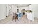Bright kitchen with a large island offering seating, stainless steel appliances, and natural light at 1427 Rosemont Dr, Indian Land, SC 29707