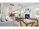 Bright and airy living room showcases an open floor plan and seamless flow to the kitchen at 1427 Rosemont Dr, Indian Land, SC 29707