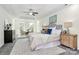 Spacious main bedroom features a tray ceiling, neutral carpet, and plenty of natural light at 1427 Rosemont Dr, Indian Land, SC 29707
