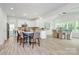 Open floorplan featuring a kitchen, dining area, and seamless integration into the home's living spaces at 1427 Rosemont Dr, Indian Land, SC 29707