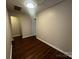 Neutral bedroom with modern wood-look flooring and light walls at 165 Brantley Place Dr, Mooresville, NC 28117