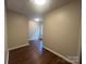 Clean room with modern wood-look flooring and neutral walls at 165 Brantley Place Dr, Mooresville, NC 28117